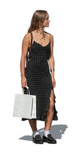 teenage girl with shopping bag standing