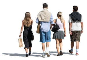 group of four young people walking