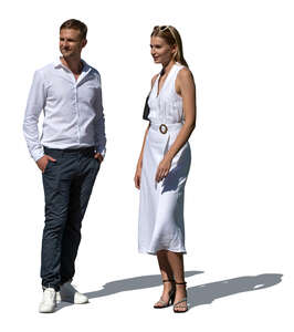 elegant man and woman standing outside