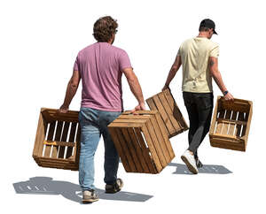 two men carrying wooden crates