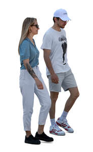 man and woman walking in side view