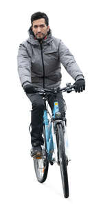 cut out spanish man in a grey autumn jacket riding a bike