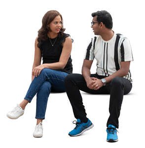 man and woman sitting on a bench and talking