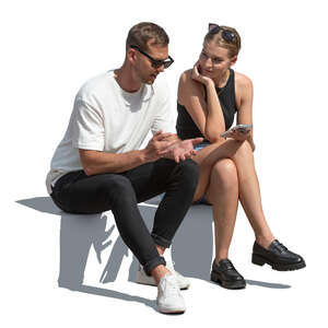 two people sitting and having a conversation