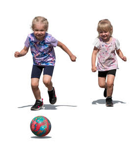 two little children running after a ball