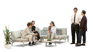 group of people at a party sitting and standing around