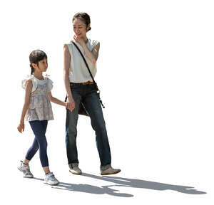 backlit image of a japanese woman and child walking hand in hand