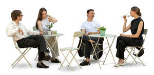 restaurant scene with young people sitting and drinking wine