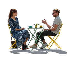 man and woman sitting in a modern cafe