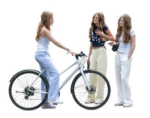 teenage girl with a bike talking to two girlfriends