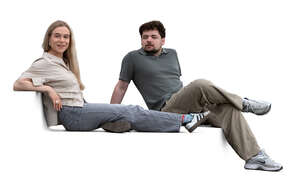 man and woman sitting on outdoor steps