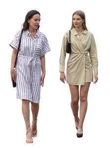 two women on high heels and wearing dresses walking