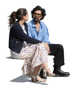 man and woman sitting together