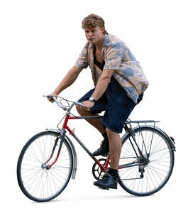 young man riding a bicycle
