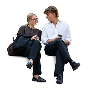 two colleagues sitting and drinking coffee