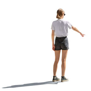 backlit young woman pointing at smth