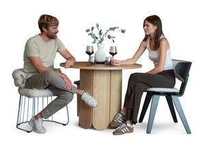 man and woman drinking wine at home