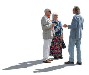 man talking to an elderly couple