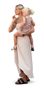 woman holding her daughter and looking out of the window