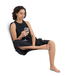 woman sitting at home and drinking wine