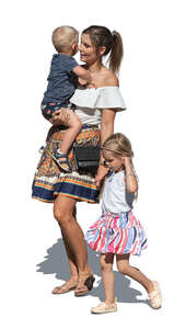 woman with two little children walking