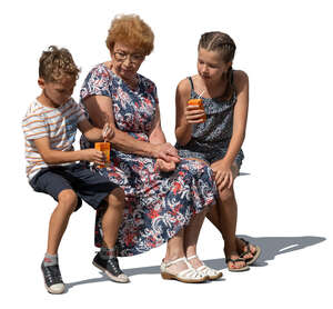 grandmother with grandchildren sitting