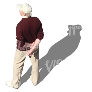 elderly man with a baseball cap standing