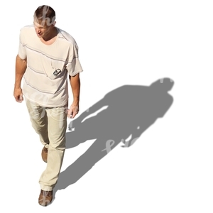 cut out man walking seen from above