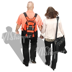 man and woman walking hand in hand