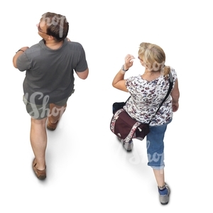 man and woman walking seen from above