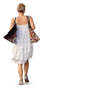 woman in a white dress carrying a shopping bag