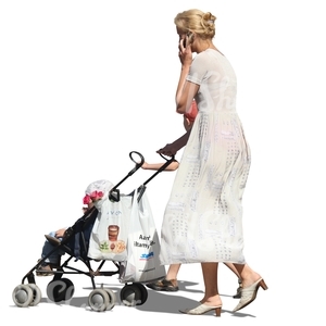 woman in a white dress pushing a stroller
