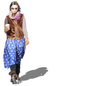 woman walking and drinking coffee