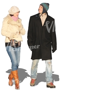 smiling couple walking in wintertime