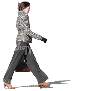 businesswoman walking on the street in autumn