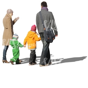 family of four walking hand in hand