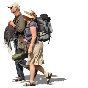 man and woman carrying heavey backpacks