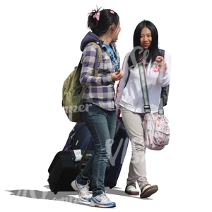 two asian women walking with suitcases
