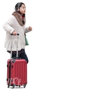 cut out asian woman standing with a suitcase