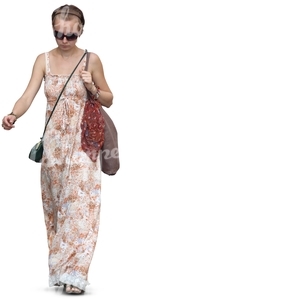 cut out woman in a long summer dress walking