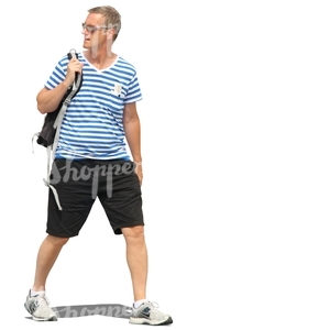 man in a striped shirt walking