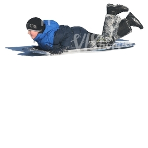 cut out teenager riding a sledge