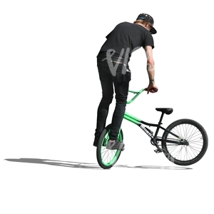 cut out teenage boy jumping with a bike