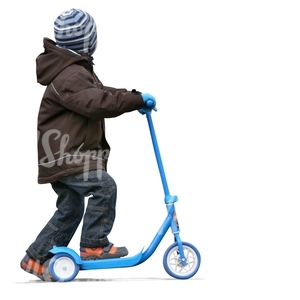 cut out young boy riding a scooter
