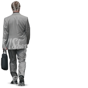 businessman walking with a bag in his hand