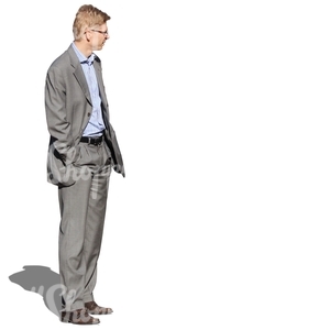 cut out man in a grey suit standing