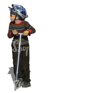 young boy riding a scooter