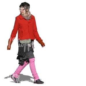 woman in a colorful outfit walking in autumn