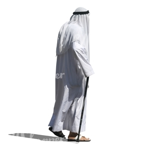 arab man in a white dishdasha walking 