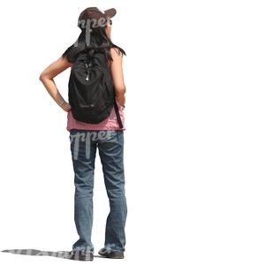 woman with a backpack standing and looking